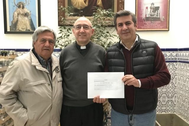 Donación de la Real Hermandad del Santo entierro de San Fernando a las Cáritas Castrense